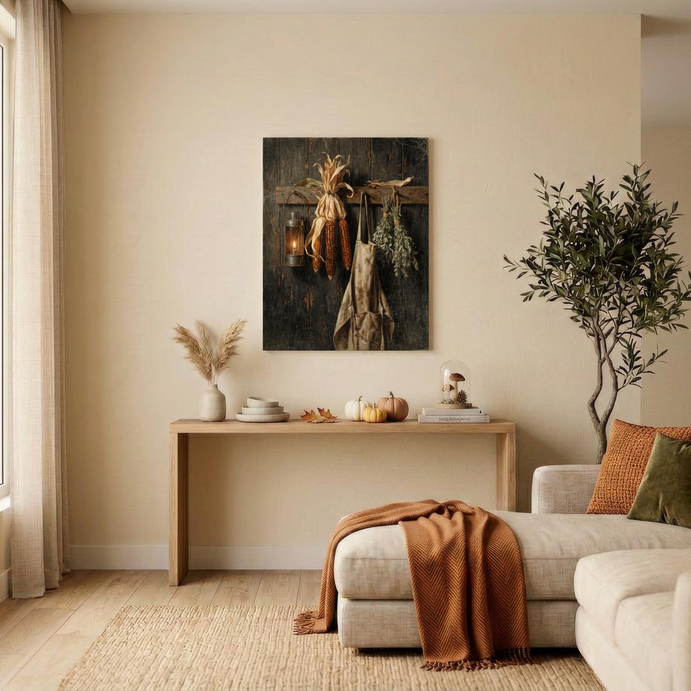 Dried Corn and Apron wall art hanging in a styled room: dried corn, a worn work apron and herb bundles hanging from a peg rail beside a candle lantern
