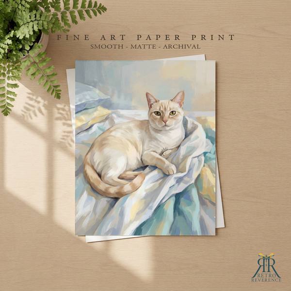 Custom cat portrait of a cat settled on a rumpled duvet, making the bed impossible as a framed fine art paper print